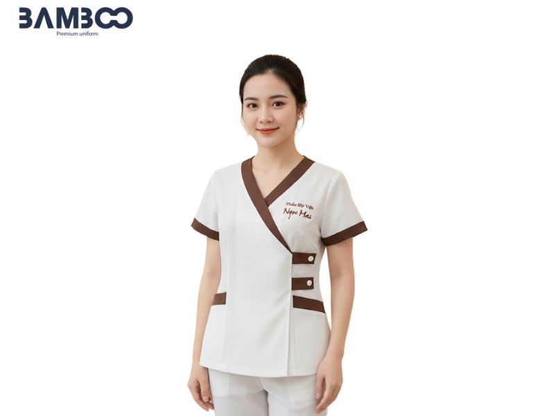 Đồng phục Ngọc Mai cổ tim viền nâu, sang trọng, tôn dáng và chuyên nghiệp