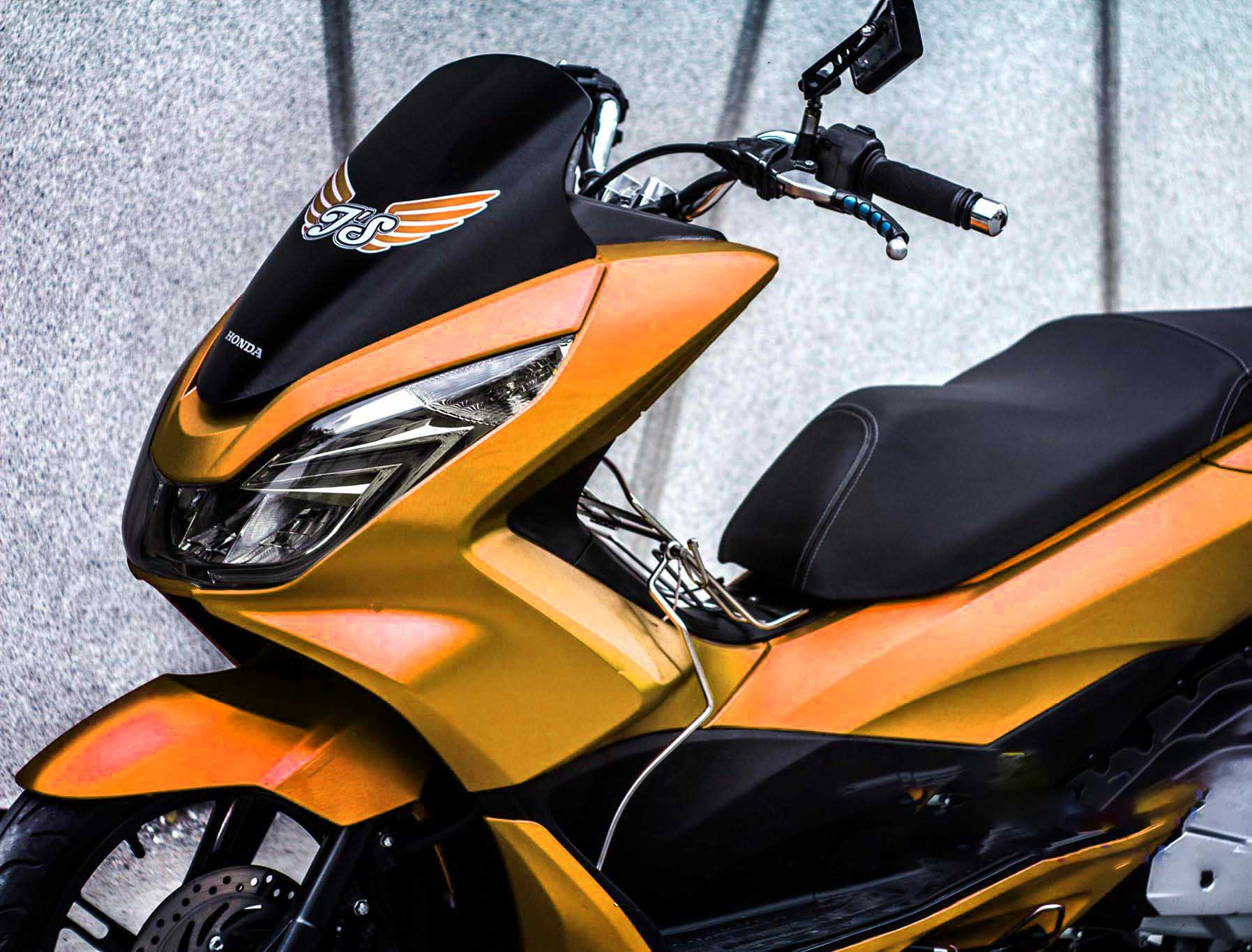 Honda PCX dán đổi màu decal nhôm xước màu cam nổi bật