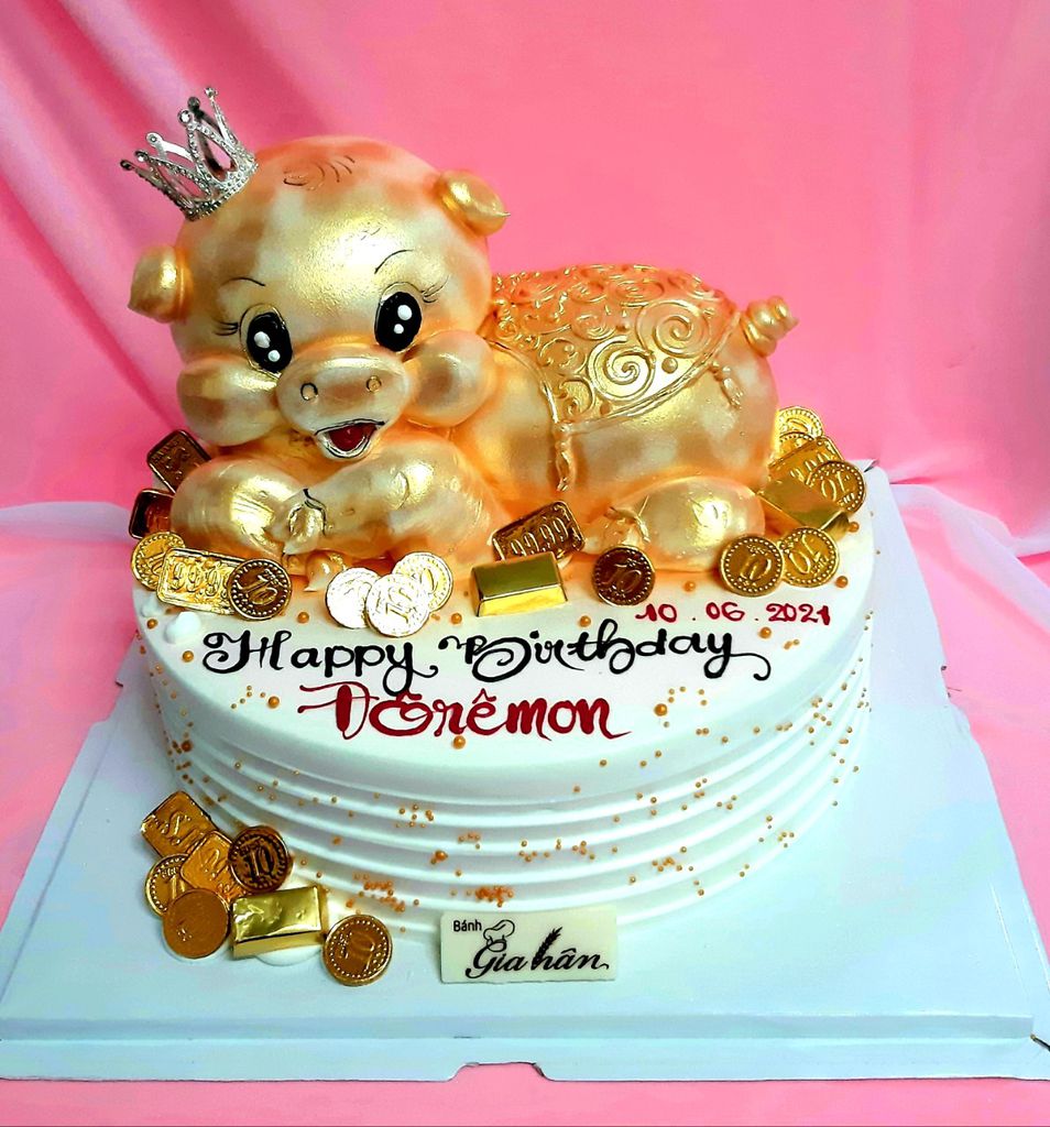 Bánh kem trang trí con heo vàng