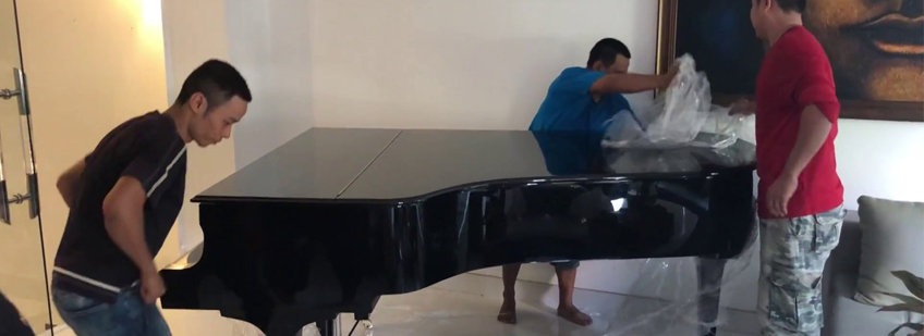 bốc nâng đàn piano của chuyển nhà trọn gói kiến vàng