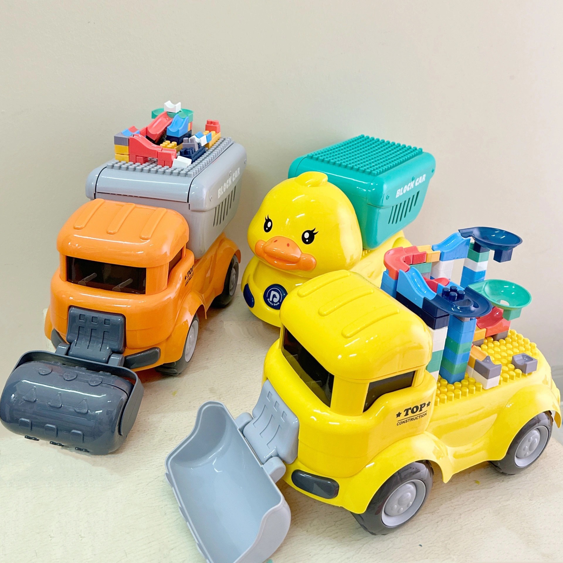 Bộ đồ chơi xe ô tô máy xúc chở 124 chi tiết lắp ráp 2in1