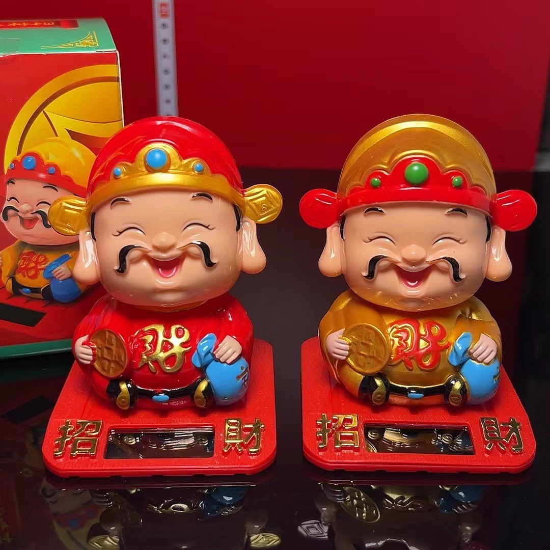 Tượng thần tài cầm ĐỒNG TIỀN tự động gật đầu chiêu tài lộc