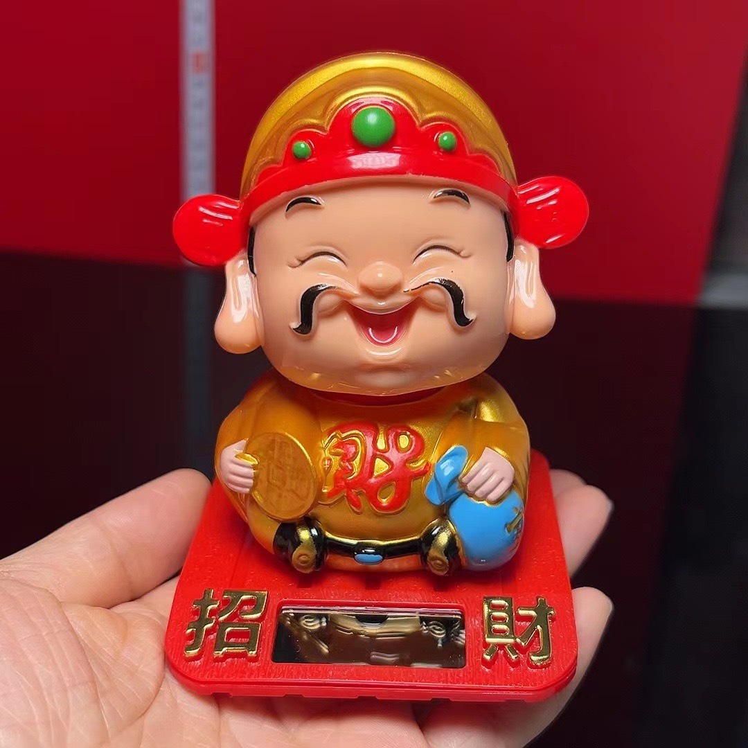 Tượng thần tài cầm ĐỒNG TIỀN tự động gật đầu chiêu tài lộc