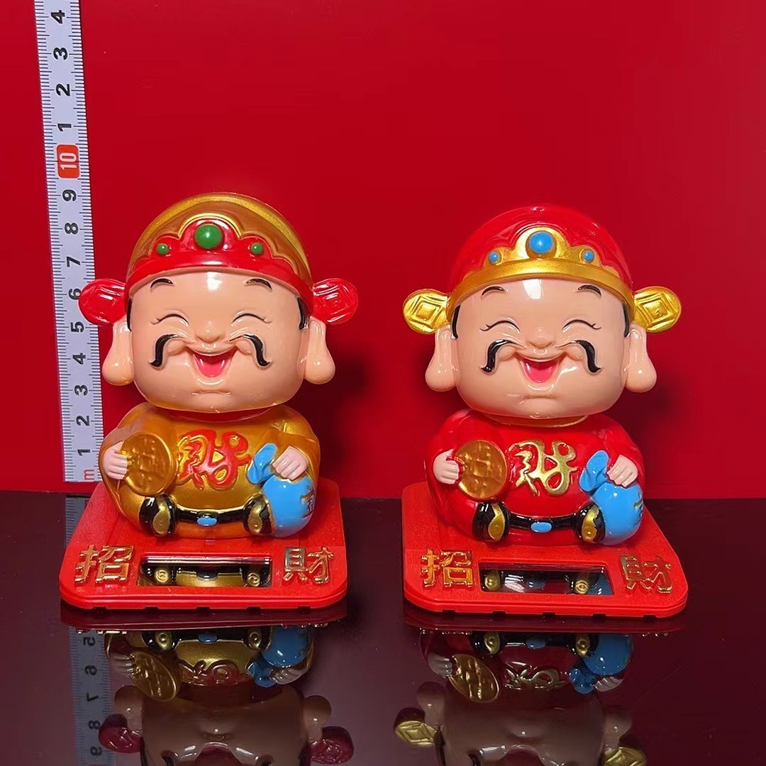 Tượng thần tài cầm ĐỒNG TIỀN tự động gật đầu chiêu tài lộc