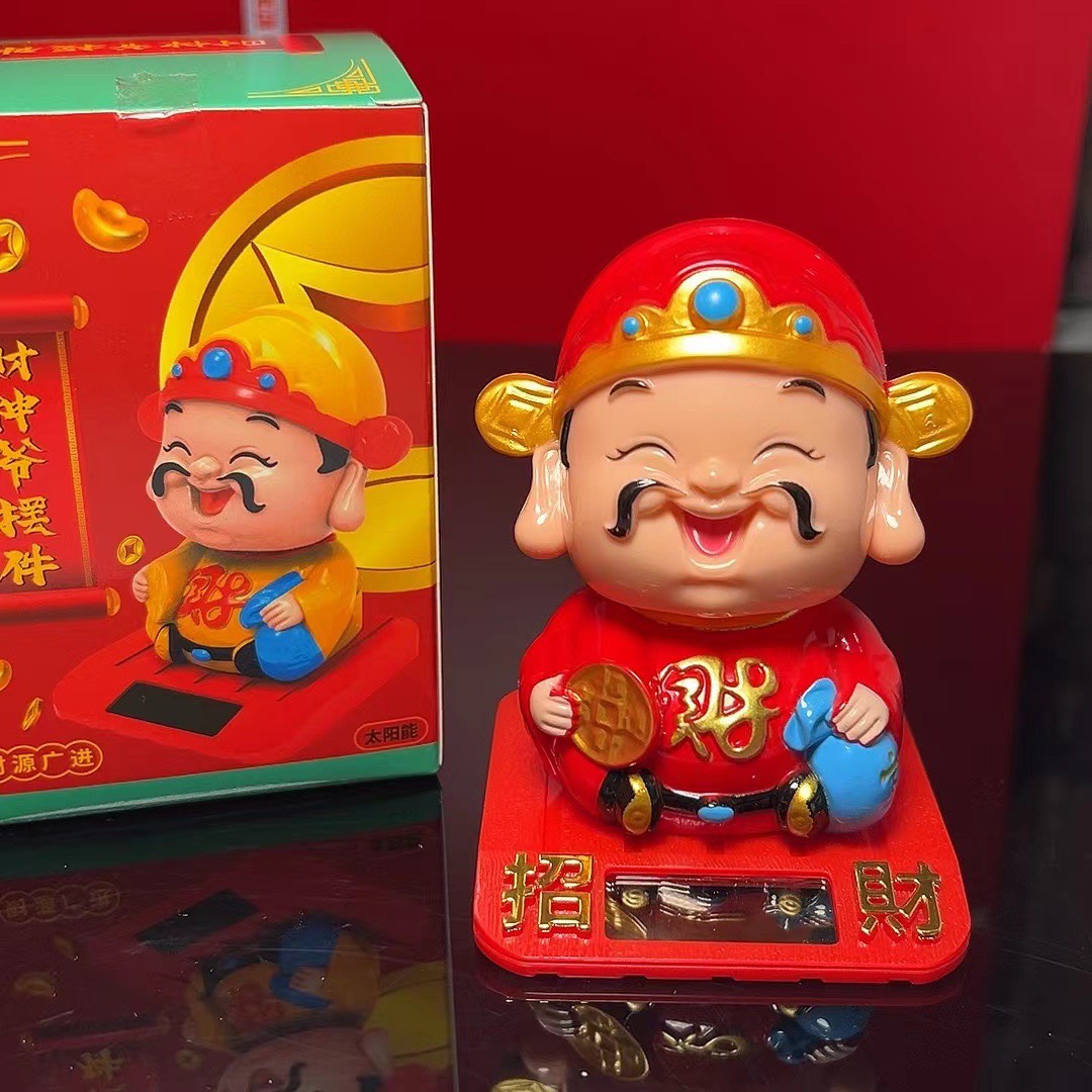 Tượng thần tài cầm ĐỒNG TIỀN tự động gật đầu chiêu tài lộc