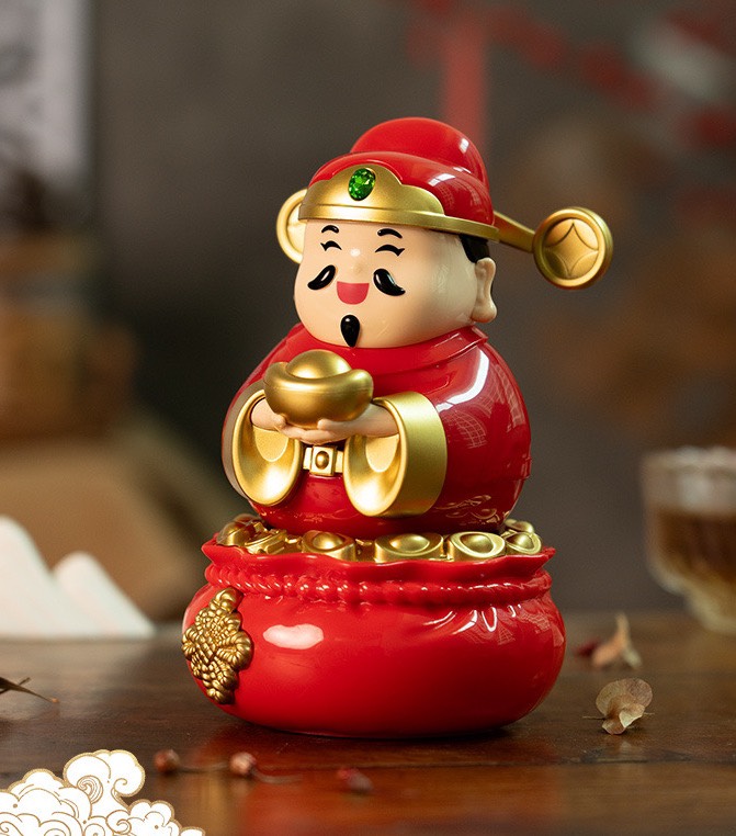 Thần tài cầm THỎI VÀNG tự động lắc gọi tài lộc may mắn