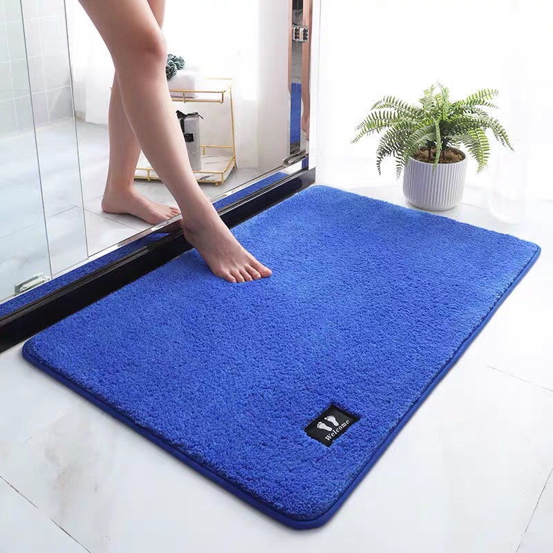 Thảm chùi chân vải nhung logo hình bàn chân cao cấp