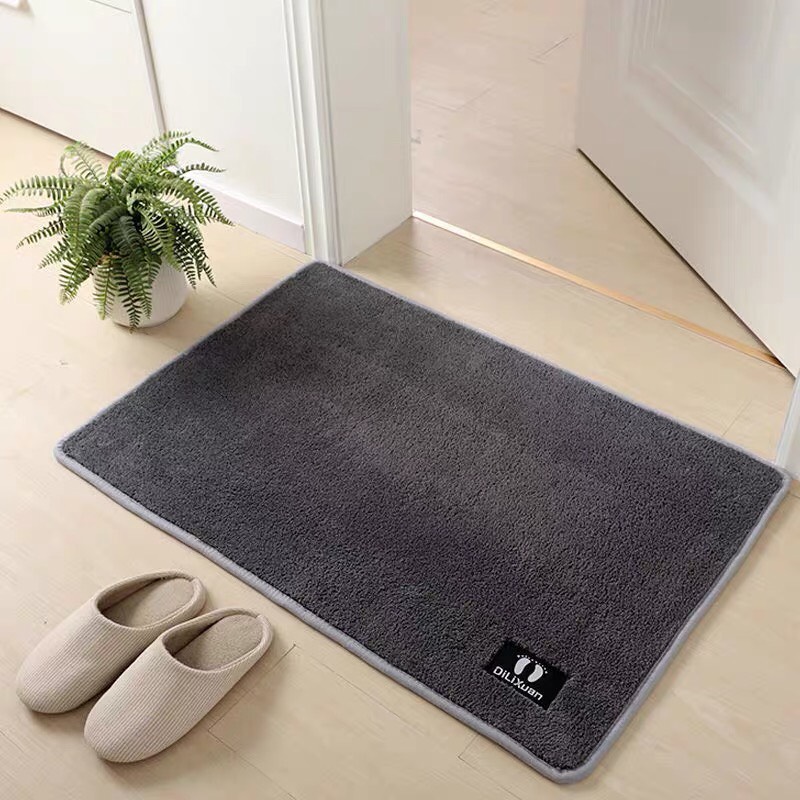 Thảm chùi chân vải nhung logo hình bàn chân cao cấp