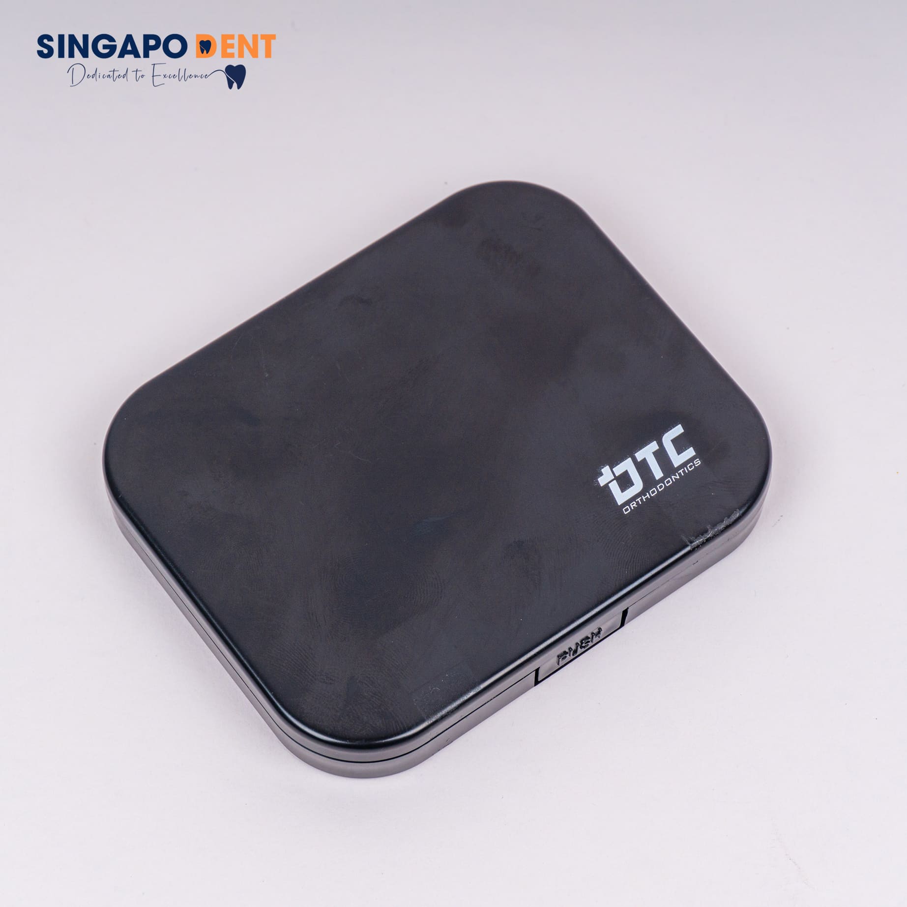 Mắc Cài Tự Đóng Cánh Cam Cải Tiến - DTC