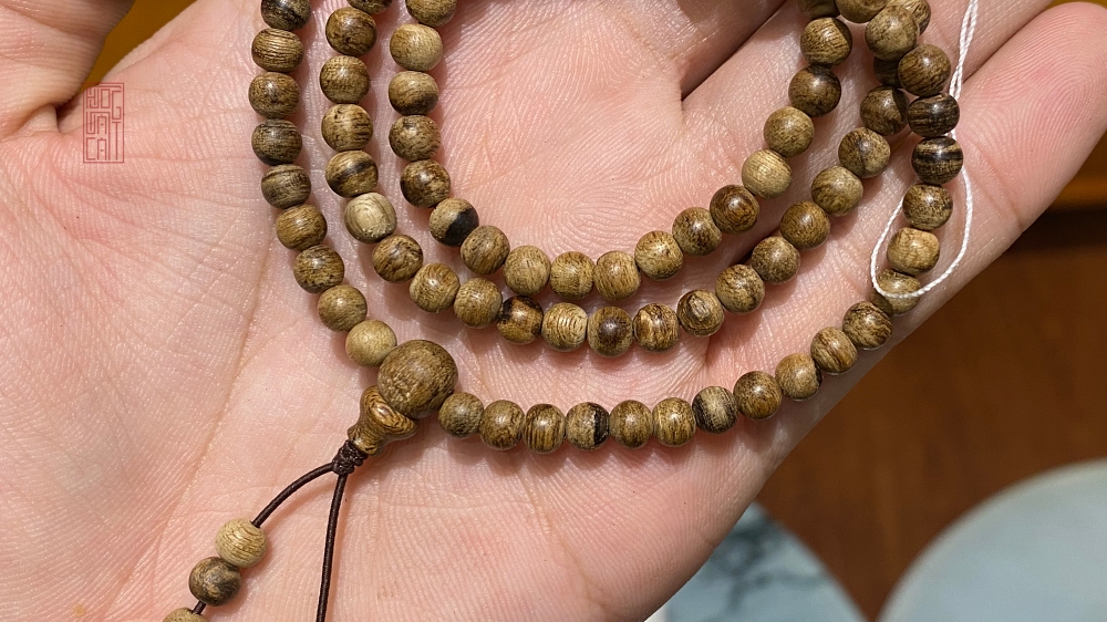 vòng trầm 108 hạt size 5 li banh bông