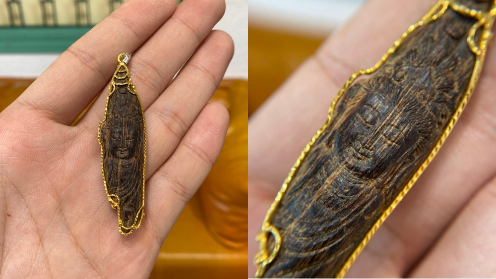 mặt trầm chìm khắc quan âm bọc vàng 18k