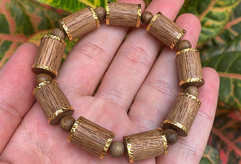 vòng trầm hạt trúc bọc vàng