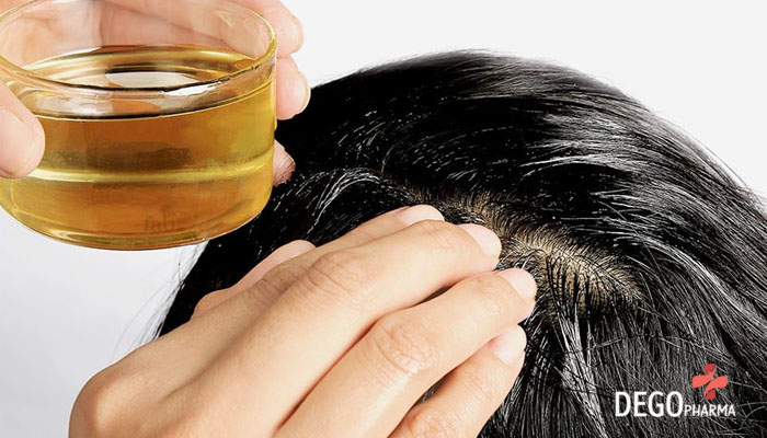 trị rụng tóc bằng dầu dừa.