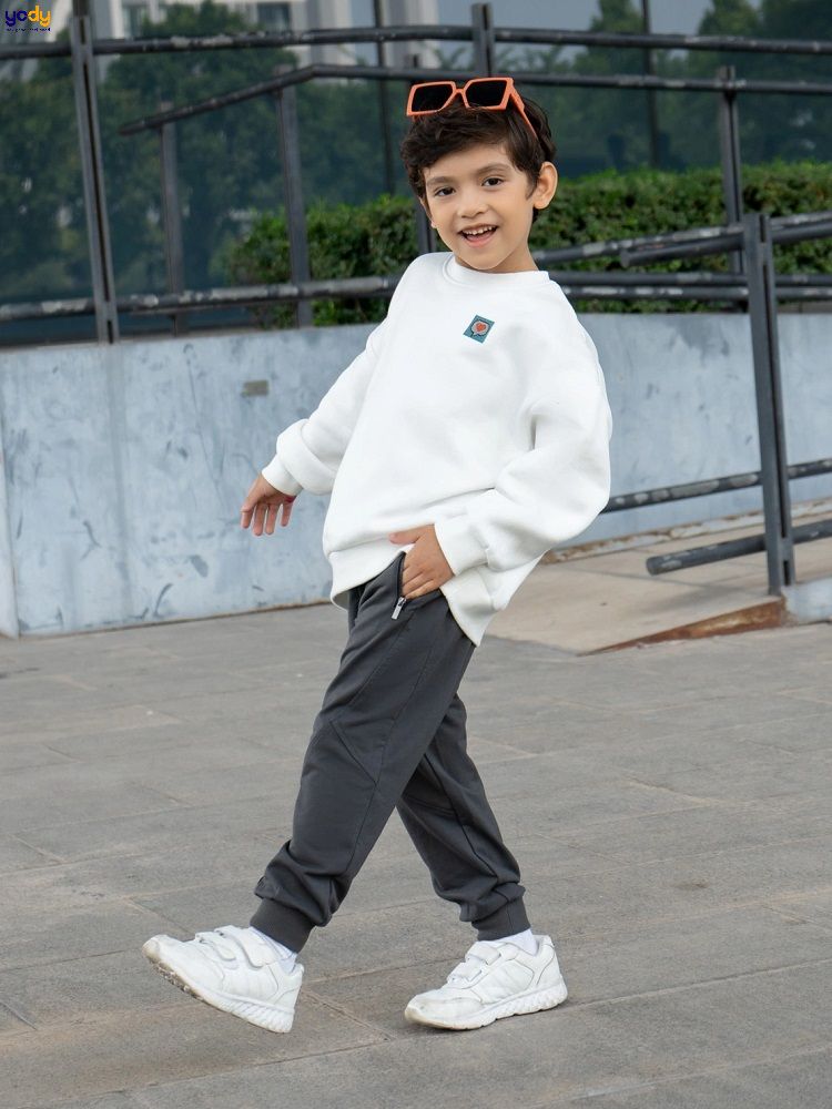 Quần nỉ kid túi khóa