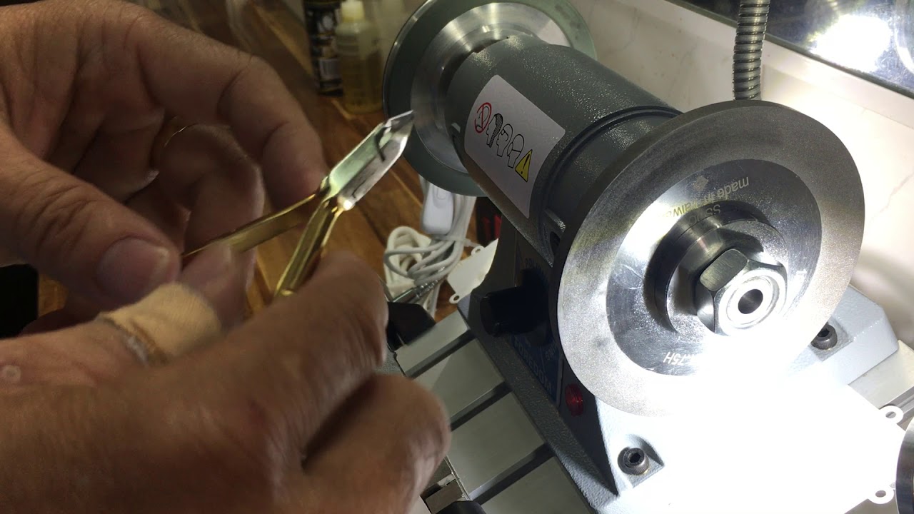 Máy mài kềm cắt da