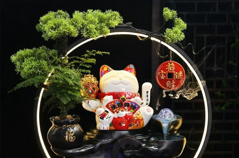 Tượng mèo thần tài may mắn vẫy tay trái