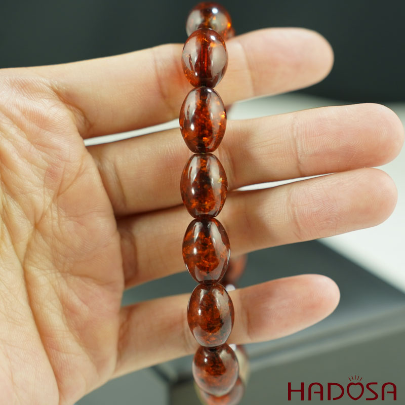 Vòng Hổ Phách Baltic vàng nâu hạt olive 10x14mm