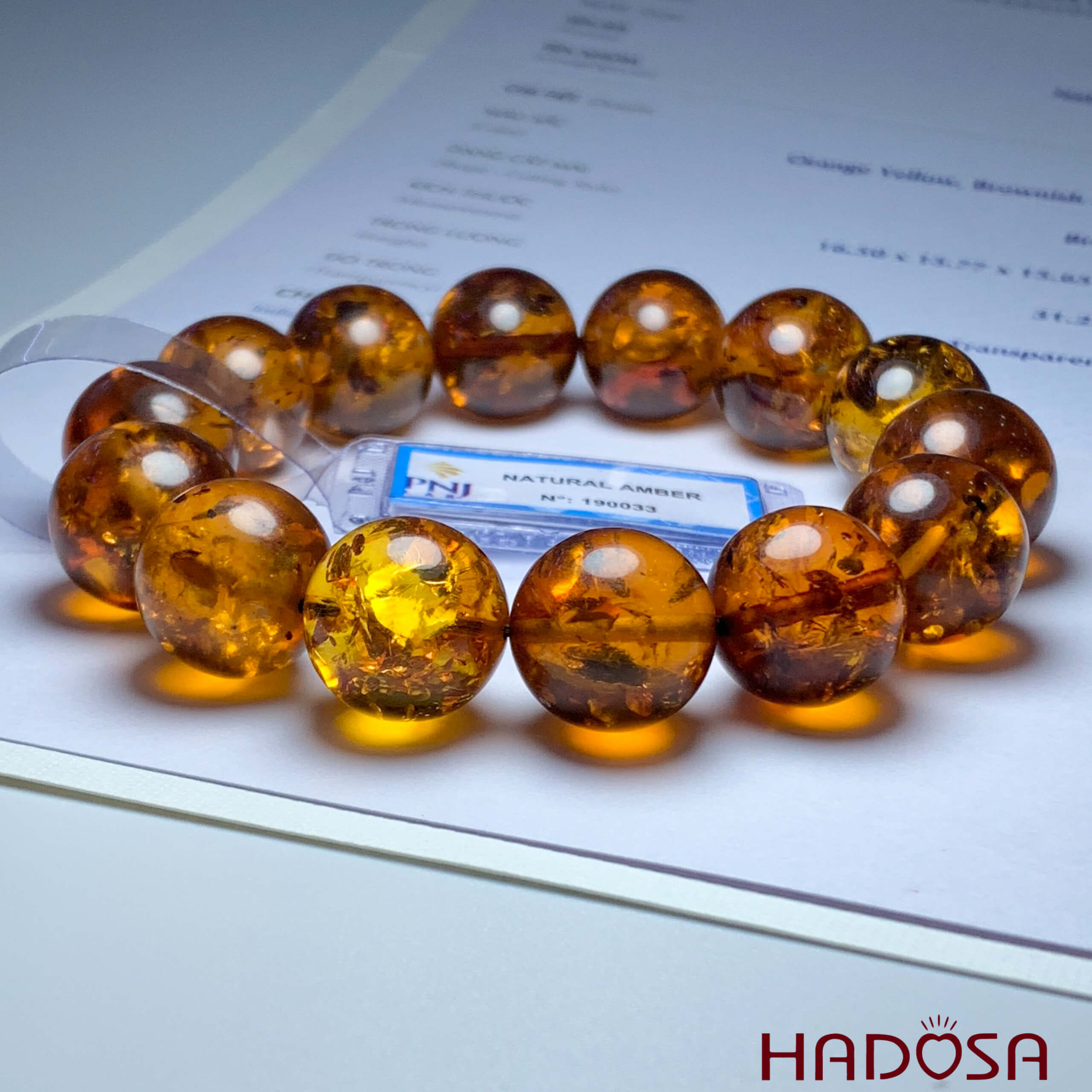 Vòng Hổ Phách huyết vàng nâu 16mm