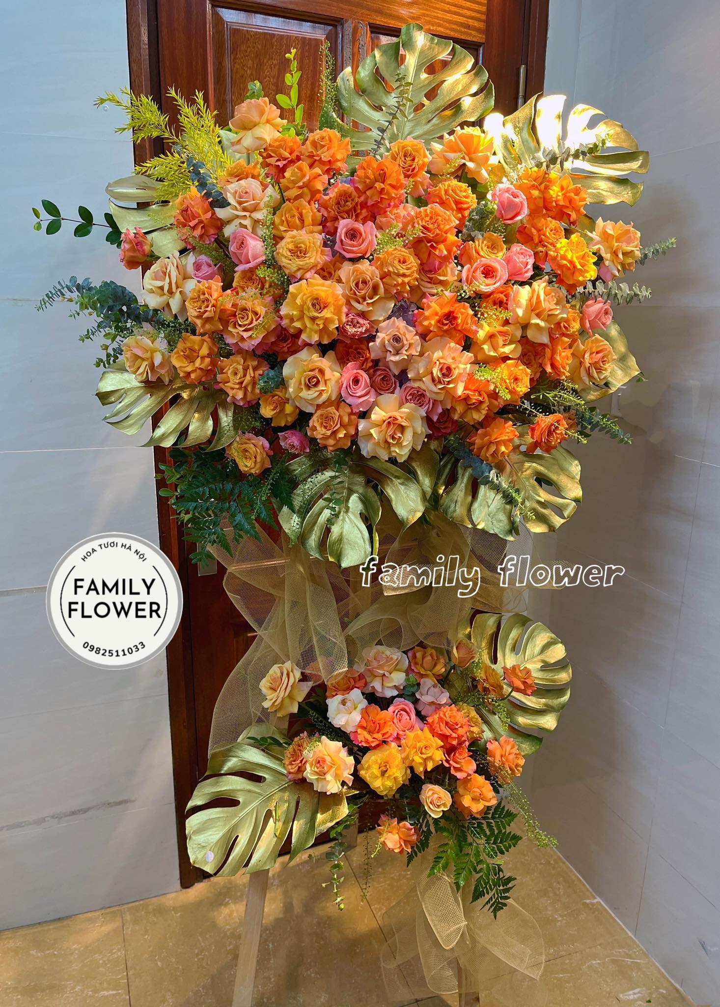 Kệ hoa khai trương tone cam chúc mừng 20/11 tại Hà Nội ! Mua hoa tươi Ba Đình! Hoa tươi Hà Nội