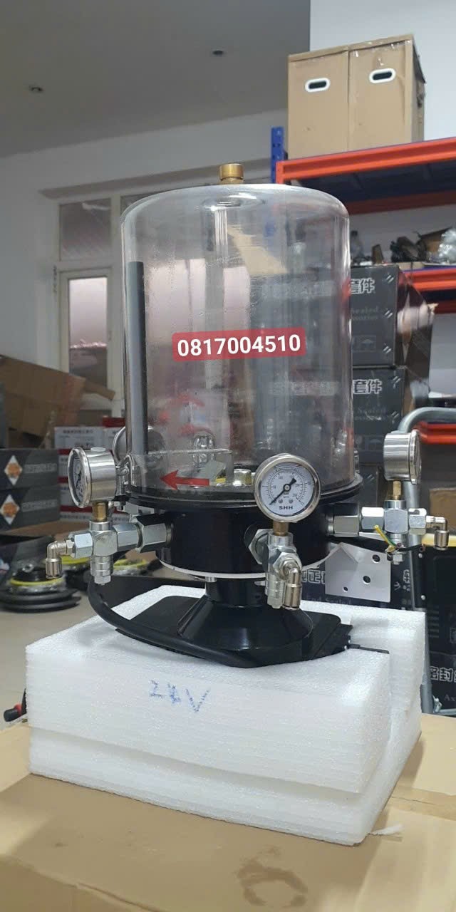 bơm mỡ tự động trung khoa