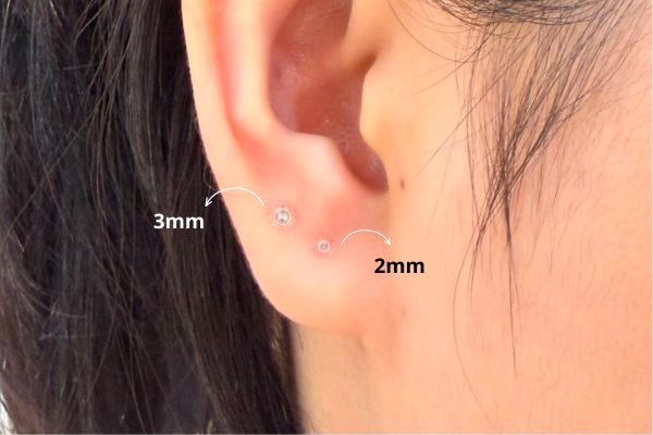 khuyên thuỷ tinh giữ lỗ tiệt trùng tiệt trùng bán tại TinyBox