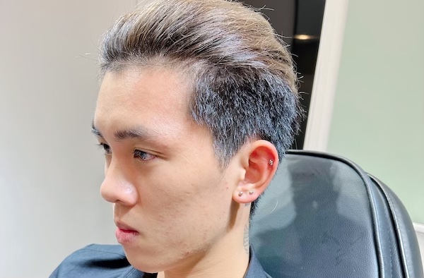 Hình ảnh nam xỏ sụn tai chất