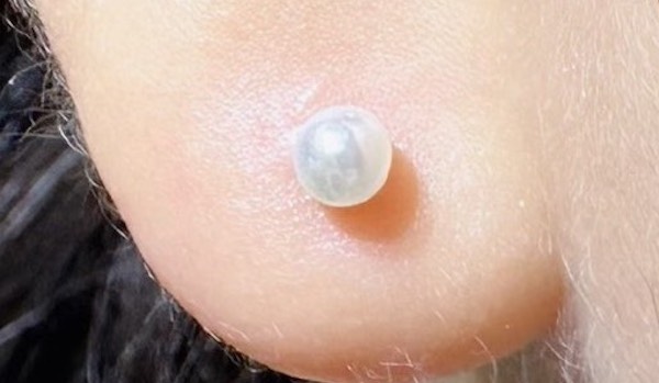 xỏ khuyên tai nữ cá tính - xỏ khuyên thịt tai