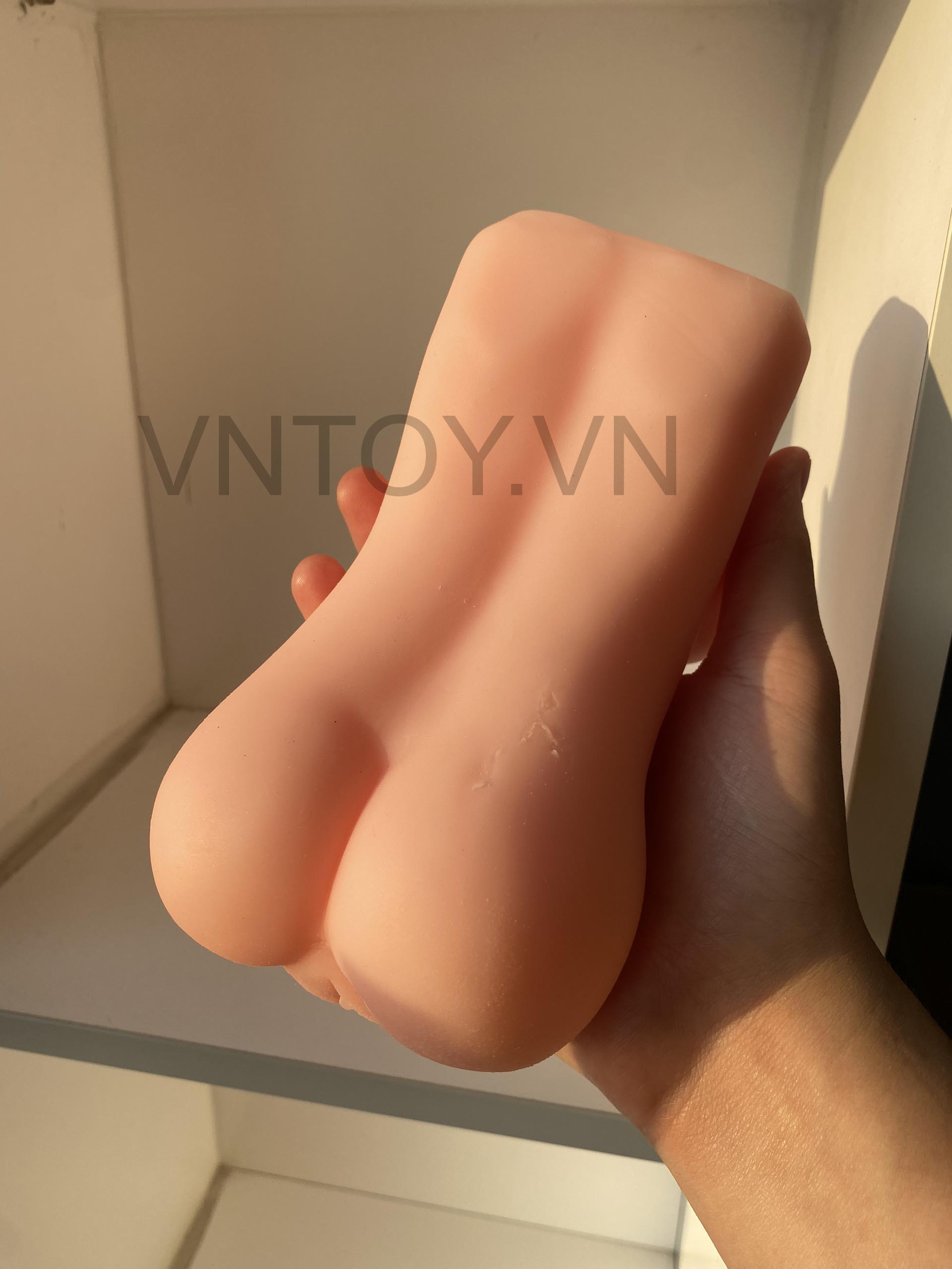 Âm đạo giả cầm tay có vú