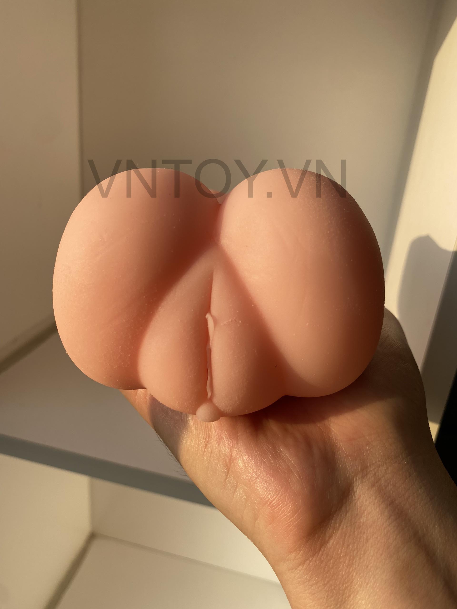Âm đạo giả cầm tay có vú