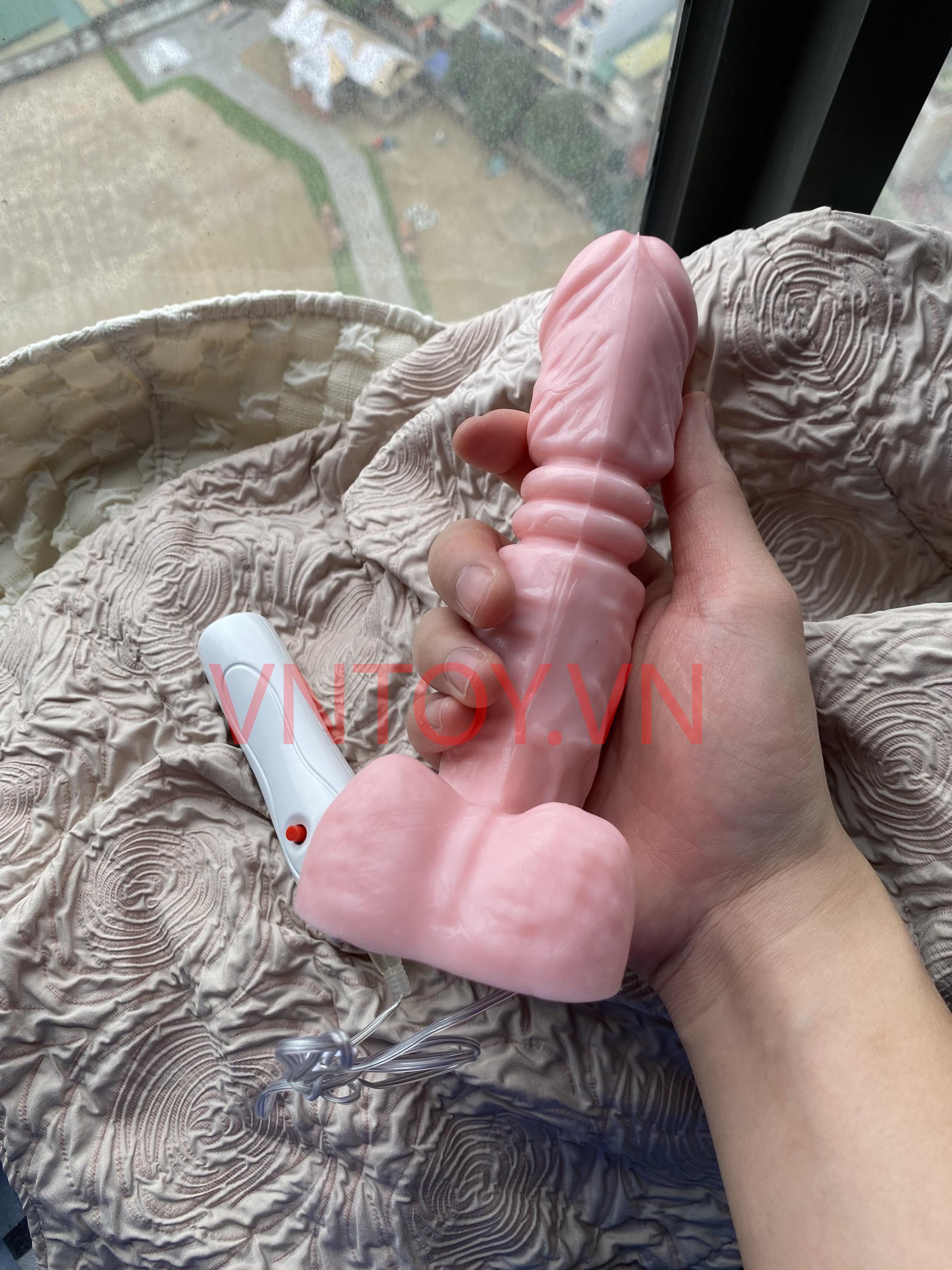 Dương vật giả điều khiển Jiuai rung thụt màu hồng