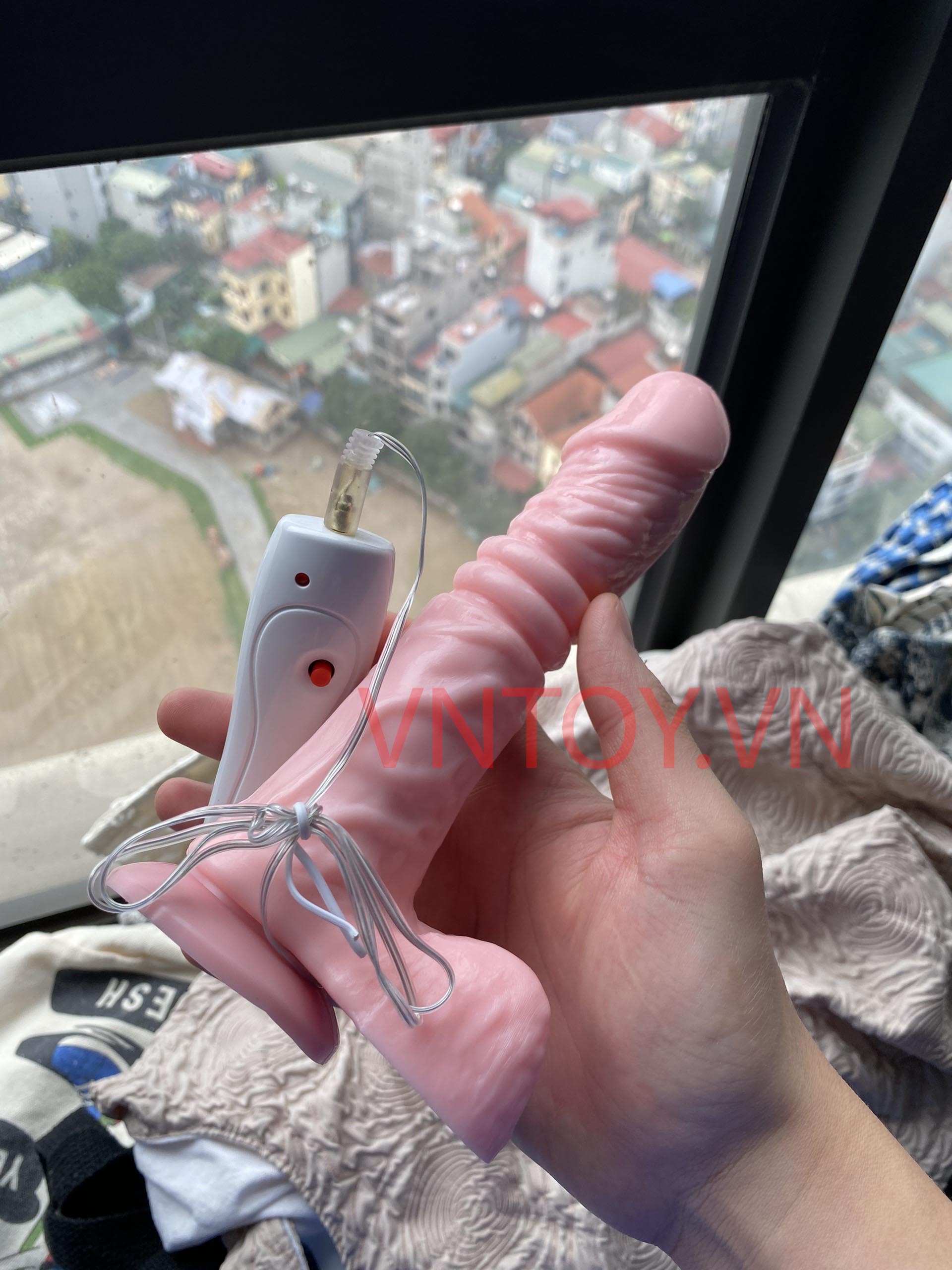 Dương vật giả điều khiển Jiuai rung thụt màu hồng