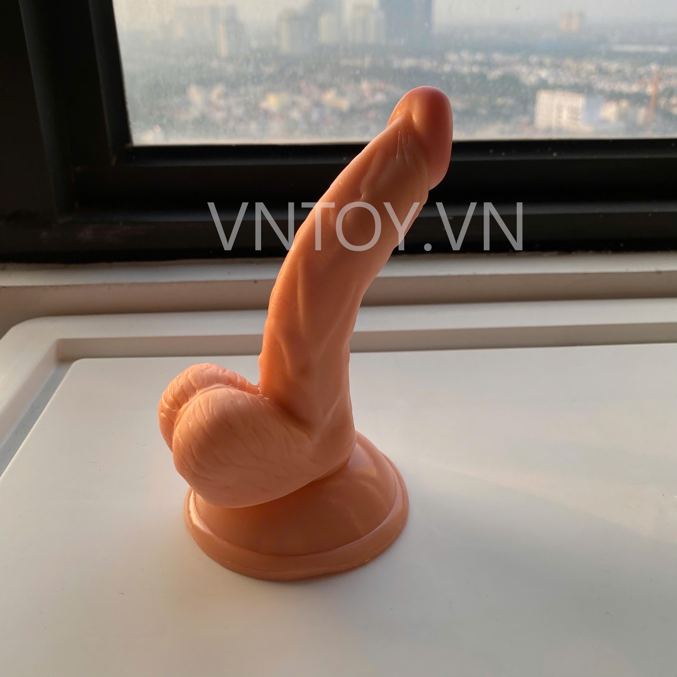 Dương vật giả gắn tường kiểu dáng cong nhỏ gọn trắng hồng