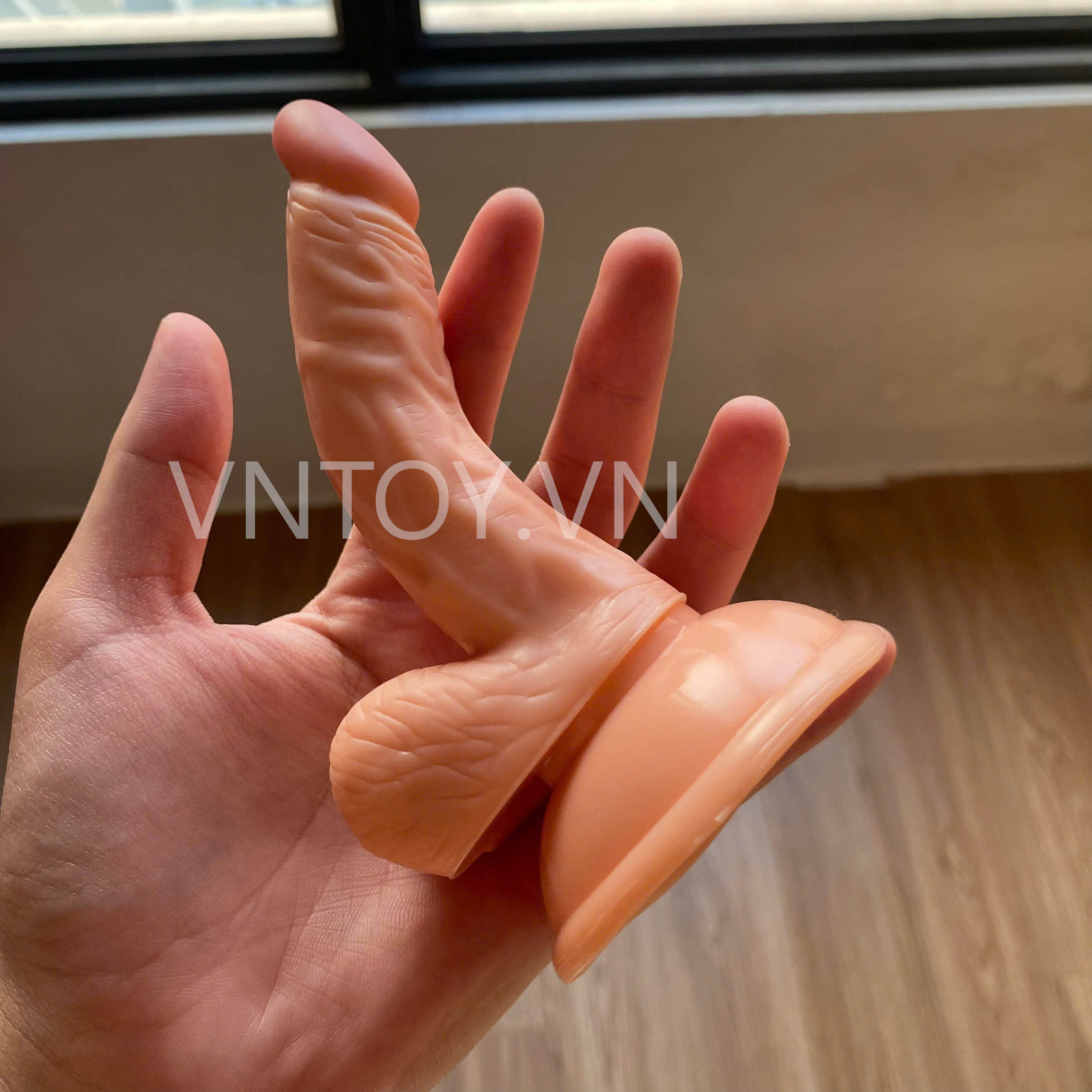 Dương vật giả gắn tường kiểu dáng cong nhỏ gọn trắng hồng