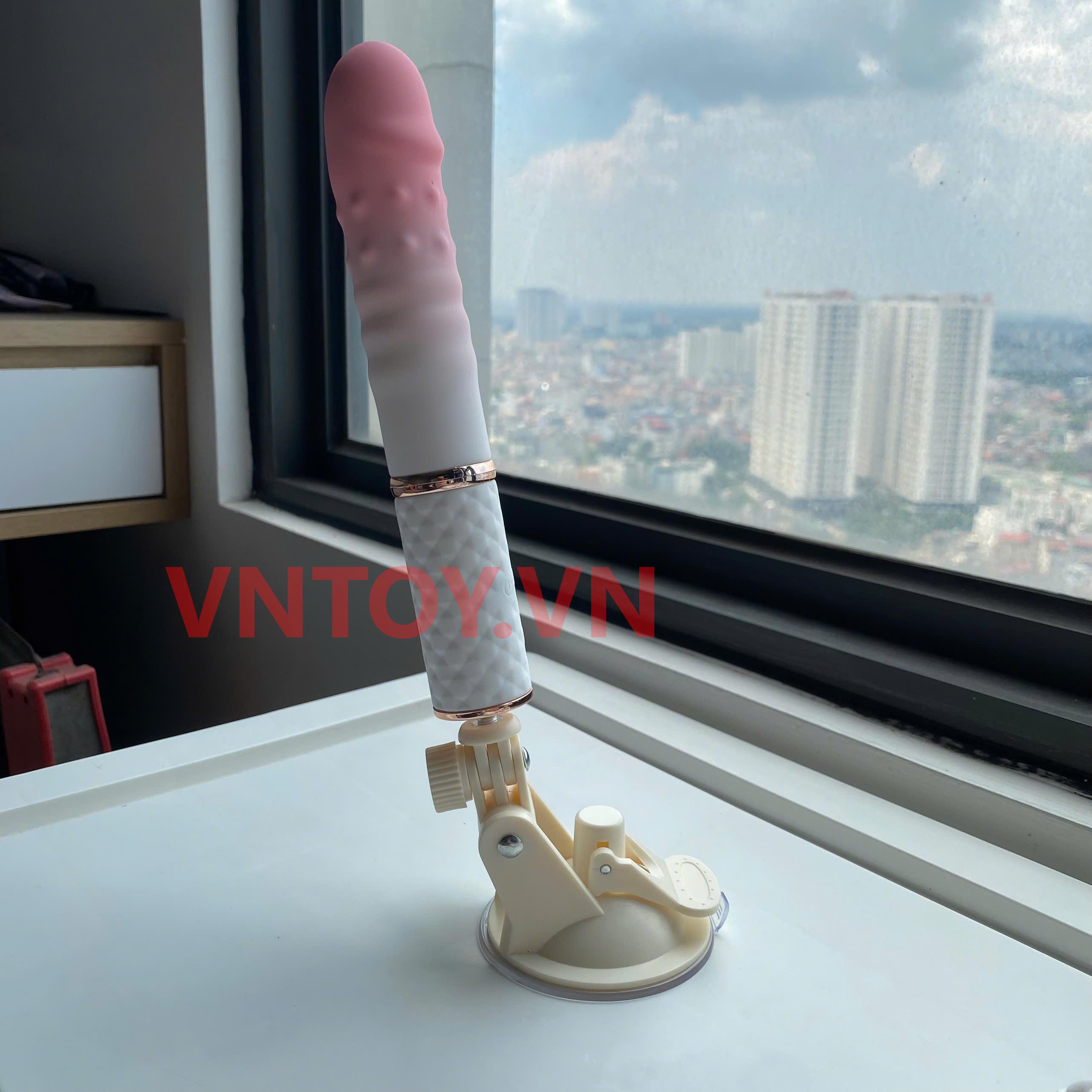 Dương vật giả tự động rung thụt điều khiển app điện thoại kèm chân đế gắn tường