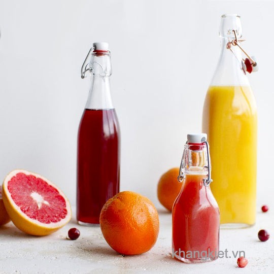 Chai thủy tinh nắp cài đựng nước ép cam bưởi tươi mát