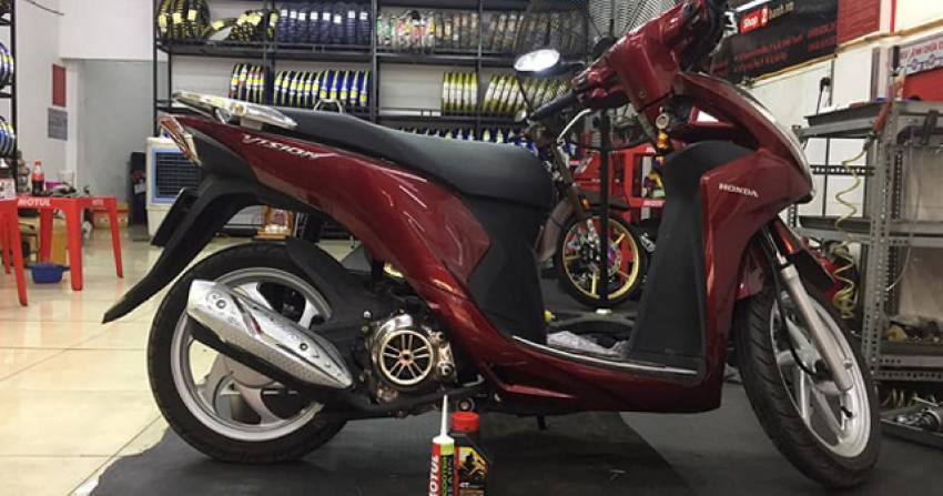 thay dầu cho xe vision