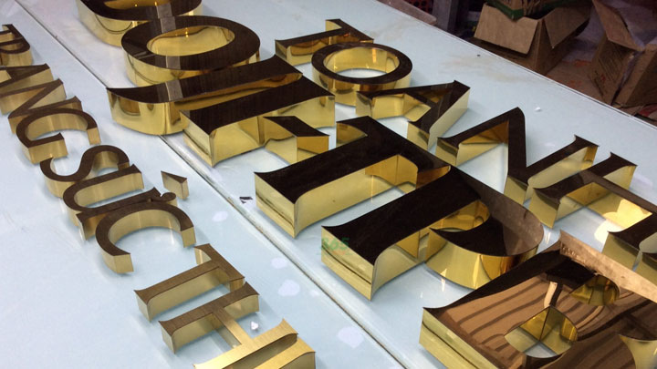 Chữ inox vàng bóng cho trung tâm thương mại