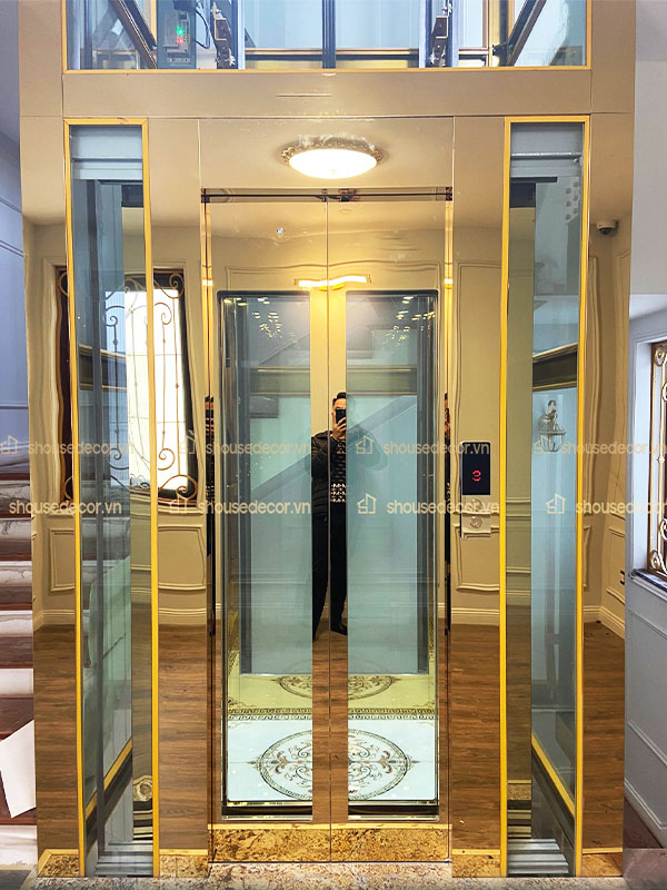 Ốp inox thang kính mẫu màu vàng 8K sóng bóng, sang trọng