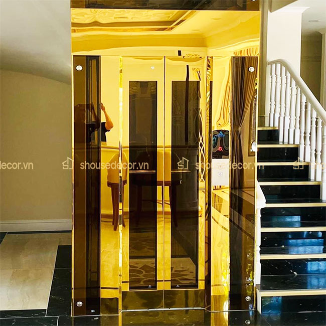 Minh họa ốp inox vàng cho thang máy kinh mẫu OTMKV06