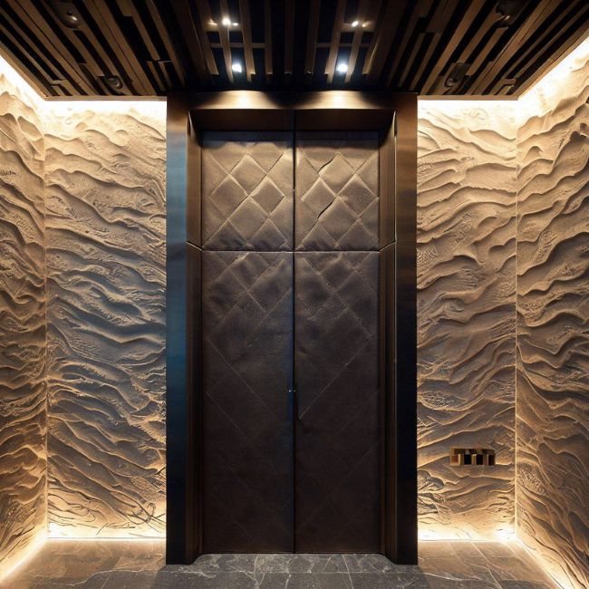 Cửa thang máy được ốp bằng đá nhân tạo giả da