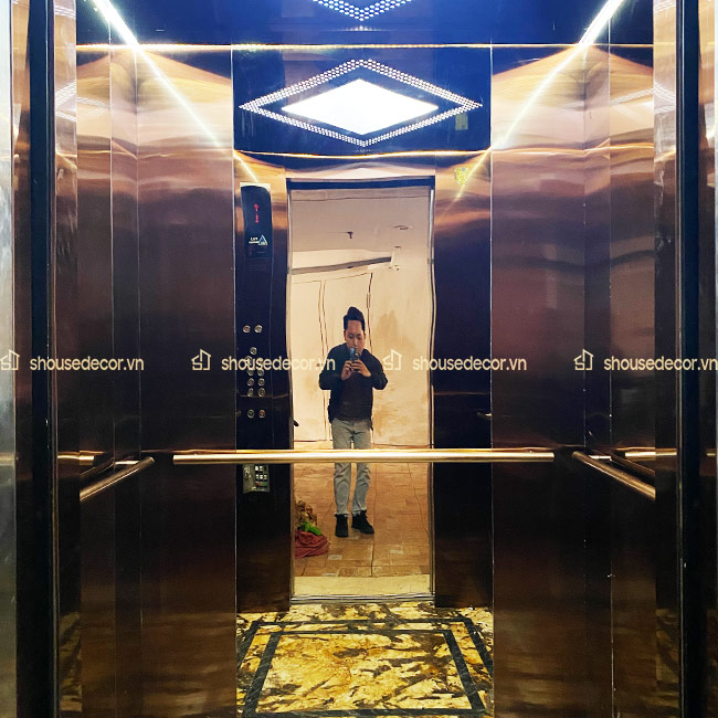 Sử dụng ốp inox thang máy màu hồng đồng tại dự án Paris Club