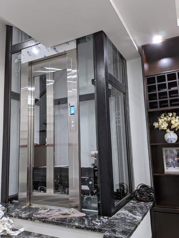 Mẫu thang máy kính 1