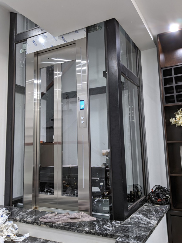 Mẫu thang máy kính 5