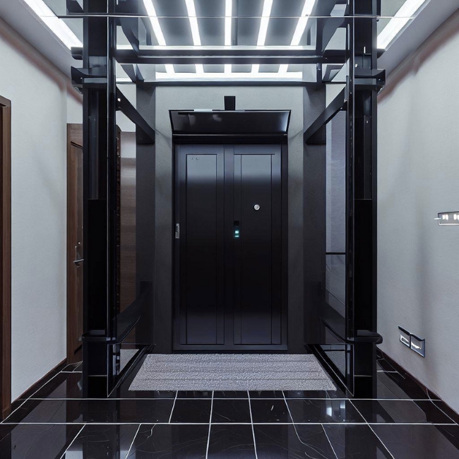 Mẫu thang máy kính gia đình được ốp inox đen
