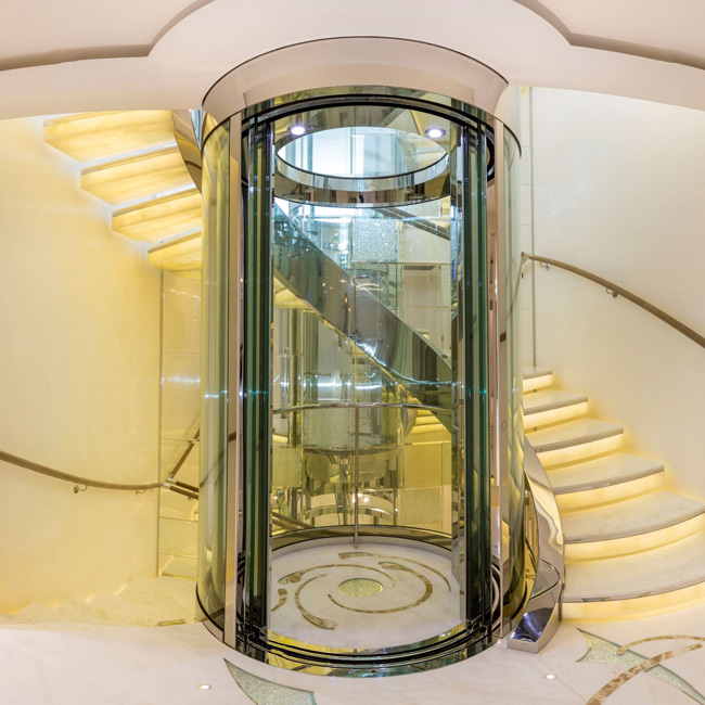 Thang máy kính tròn có kiểu dáng hiện đại, độc đáo và tạo điểm nhấn cho công trình