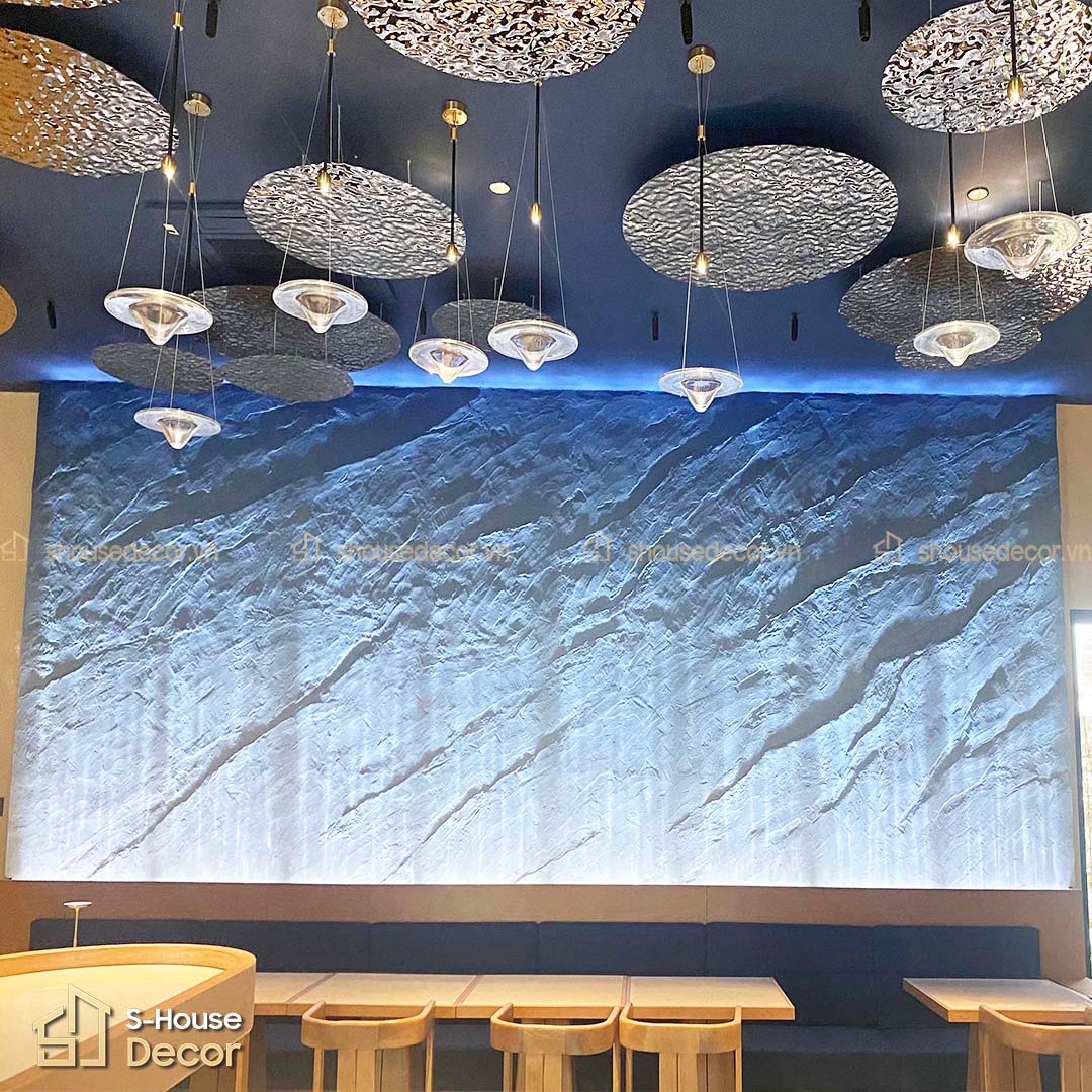 Hệ trần lượn sóng kết hợp cùng ánh sáng LED mang đến cảm giác chuyển động thị giác tinh tế