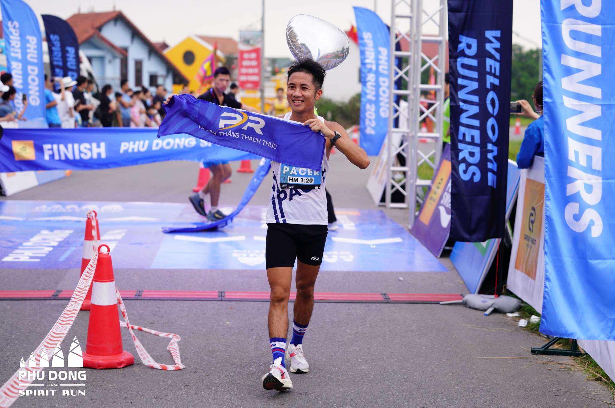 Nguyễn Quốc Anh làm Pacer tại Giải Phu Dong Spirit Run-ngày thời tiết nắng từ sáng sớm
