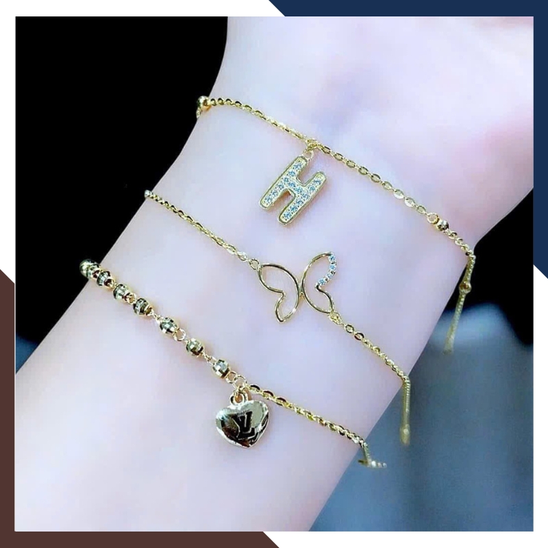 Lắc Tay Vàng Nữ 10K LTVN358 Mix Charm Cá Heo, Cỏ 4 Lá & Bi Vàng 3 Màu