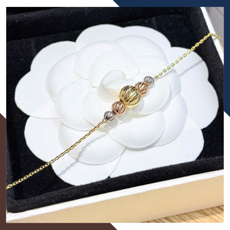 Lắc Tay Vàng Nữ 10K LTVN358 Mix Charm Cá Heo, Cỏ 4 Lá & Bi Vàng 3 Màu