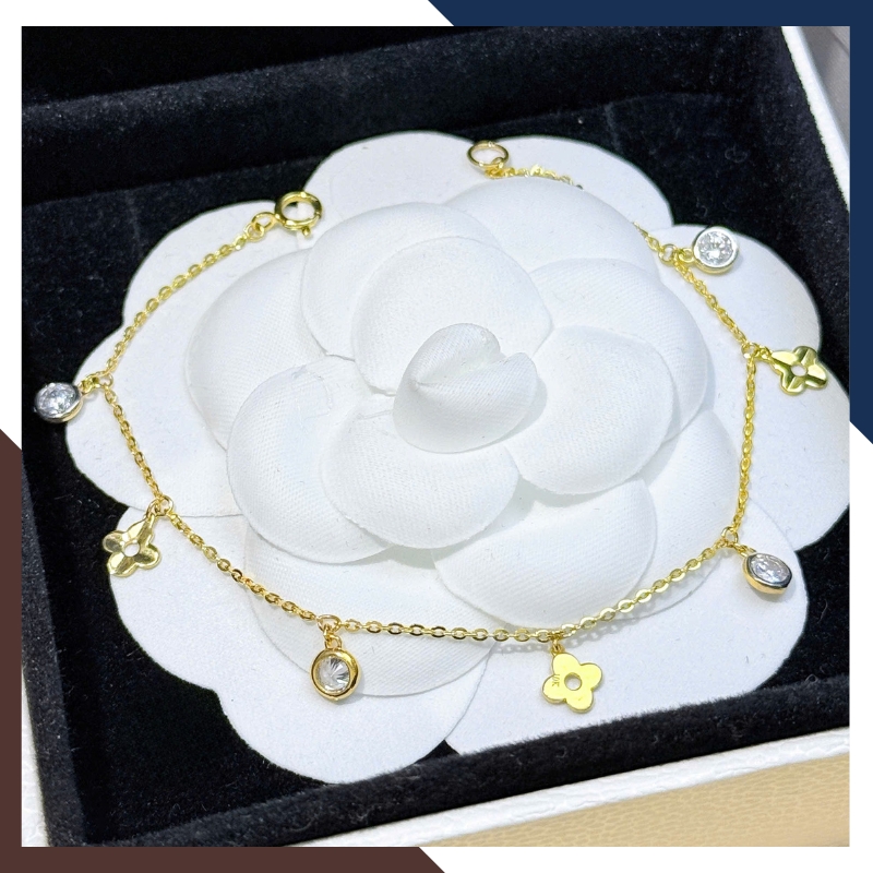 Lắc Tay Vàng Nữ 10K LTVN358 Mix Charm Cá Heo, Cỏ 4 Lá & Bi Vàng 3 Màu